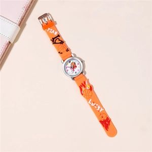 Detail of orange silicone strap with 3D basketball pattern and lucky text on kids watch