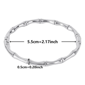 Detail view of adjustable silver bamboo-shaped bangle showing 5.5cm inner diameter size