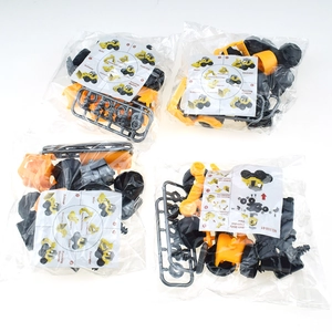 DIY construction vehicle toy set with excavator and bulldozer parts in clear bags