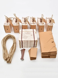 DIY kraft paper suitcase gift boxes with vintage stamps, hemp ropes and blank tags