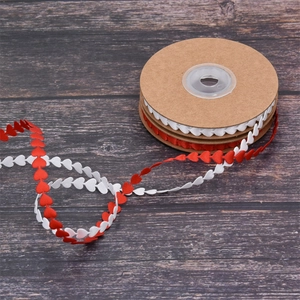 Classic red and white heart shaped wave ribbon roll for gift wrapping and DIY decor