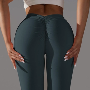 Détails arrière d'un legging taille haute effet push-up en tissu extensible bleu canard