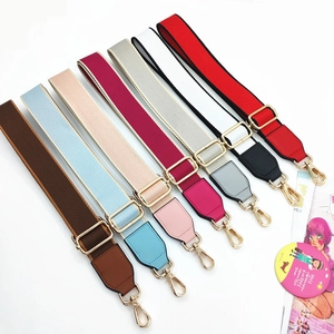 Adjustable wide canvas shoulder straps with gold hardware in various vibrant colors