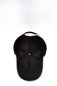 Detailed interior of the baseball cap showing breathable mesh and reinforced stitching