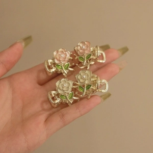 Mini rose flower hair claw clips in pink and cream with pearl center for women