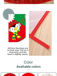 Detail of red Christmas tree skirt featuring a cute penguin pattern on wood floor