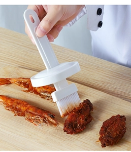 Silicone basting brush for kitchen cooking, BBQ oil brush and sauce applicator tool.