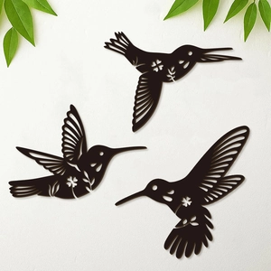 Set of 3 matte black hummingbird wall art pieces with intricate hollow design for home decor
