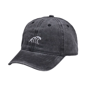 Detail of grey washed cotton baseball cap with white wave embroidery and vent holes