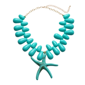Bohemian acrylic beaded necklace with turquoise teardrop beads and gold starfish pendant