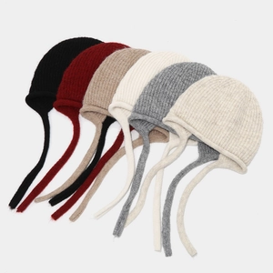 Women's warm wool knit beanie with earflaps and ties in six different colors