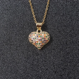 Gold plated heart pendant necklace featuring vibrant multi-color cubic zirconia stones
