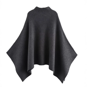 Elegant dark grey asymmetrical knitted poncho with soft textured wool blend fabric