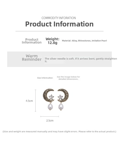 Detail of vintage moon and star earrings with faux pearl drops and crystal accents