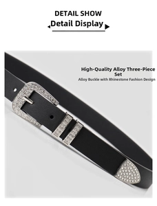 Close-up of Y2K black belt with silver rhinestone alloy buckle and metal tip detail