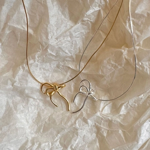 Elegant 925 sterling silver bow pendant necklaces in gold and silver finish options