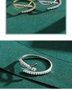 Detailed view of adjustable s925 silver criss-cross ring with pavé cubic zirconia