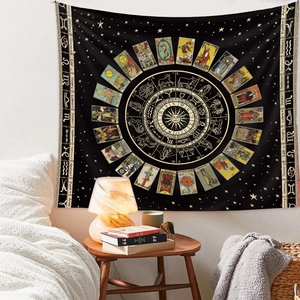 Bedroom scene showing a zodiac tarot tapestry with gold horoscopes on black fabric
