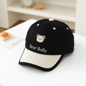 Kids baseball cap featuring bear baby embroidery in contrast black and cream colors