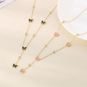 Elegant gold necklaces featuring black and pink butterfly pendants with zircon accents