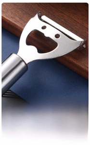 Close-up of a sharp 430 stainless steel sawtooth blade peeler with integrated bottle opener