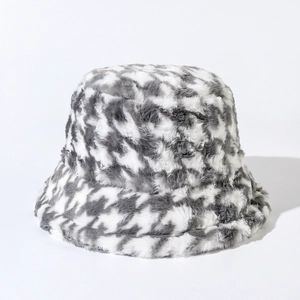 Close-up of plush houndstooth bucket hat showing fluffy texture and grey pattern