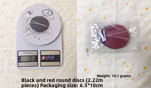 Detailed view of 2m black and red circle garland packaging showing weight and dimensions
