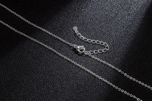 Detail of 925 sterling silver necklace clasp and extension chain with hallmark stamp
