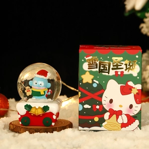 Luminous Christmas snow globe featuring Hangyodon with a festive gift box in snow scene