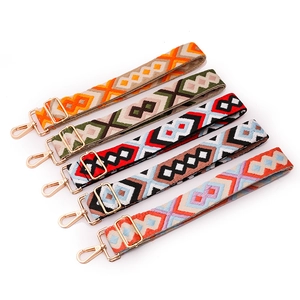 Adjustable bohemian style woven straps with colorful geometric patterns and gold metal buckles