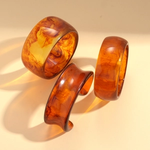 Minimalist amber resin geometric bangles featuring vintage marble pattern for women
