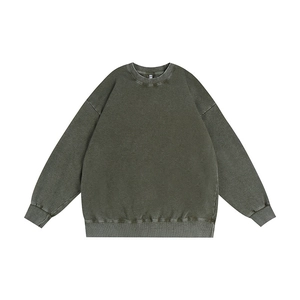 Oversized washed green cotton crewneck sweatshirt with drop shoulders and vintage texture