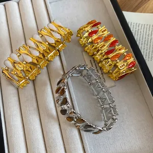 Vintage elastic drop bracelets with rhinestones in gold and silver finishes