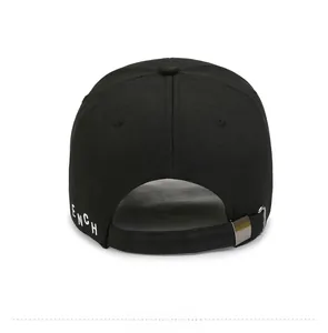 Detail of black cotton baseball cap back with adjustable metal buckle and ENCH embroidery