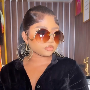 Oversize rimless round gradient sunglasses with matching tiered circle earrings