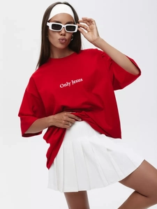 Close-up of Only Jesus print on red cotton oversize T-shirt with a loose casual fit