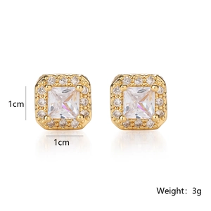 Detail of 1cm square gold studs featuring a central princess-cut cubic zirconia and halo