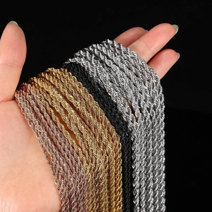 Close-up of four colors of 18K gold plated stainless steel rope chain necklaces