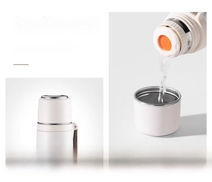Detail of 316 stainless steel vacuum flask with dual-use lid and portable carry strap
