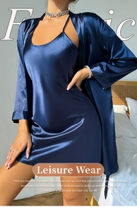Detail of dark blue satin robe and slip dress showing silky texture and draping style