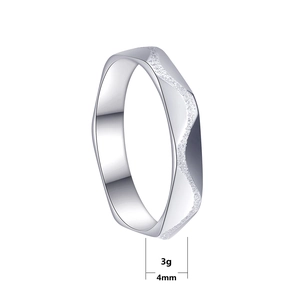 Minimalist 4mm silver frosted stainless steel ring with a geometric faceted texture