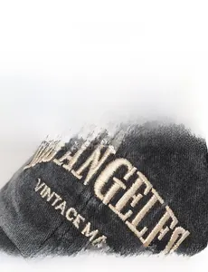 Close-up of Los Angeles vintage embroidery on black denim washed baseball cap detail