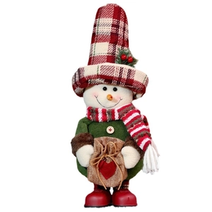 Standing Christmas snowman doll with red plaid hat and green coat holiday decoration