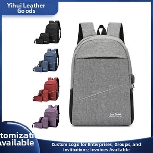 Three-piece business backpack set with USB charging port and anti-theft design in grey