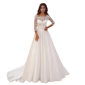 Elegant white lace wedding dress with 3/4 sleeves and a long satin train for brides