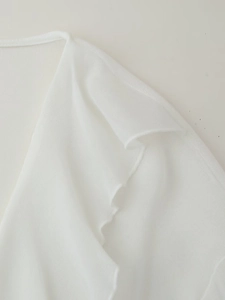 Slim fit white V-neck blouse with layered ruffle details and breathable knit texture