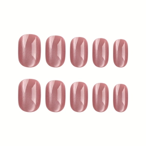 Pink cat-eye press on nails with elegant oval shape and shimmering magnetic texture