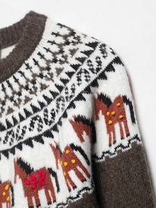 Detail of vintage jacquard knit sweater featuring horse pattern with 3D floral embroidery