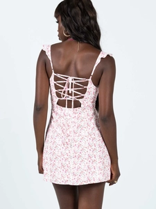 Pink floral mini dress featuring a sexy lace-up back design and delicate ruffles