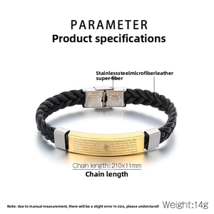 Close-up of braided leather bracelet with golden stainless steel prayer plaque detail